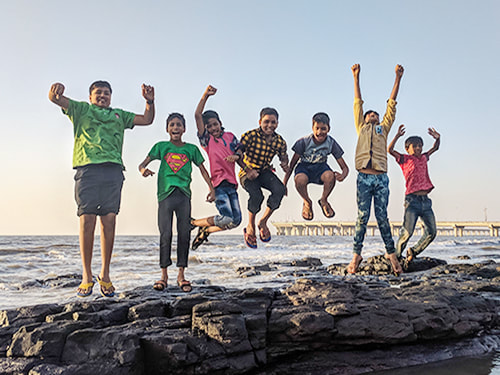 Group of boys jumping